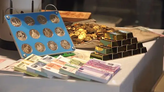 Updated exposition at the museum modern Ukrainian paper money coins souvenir bars