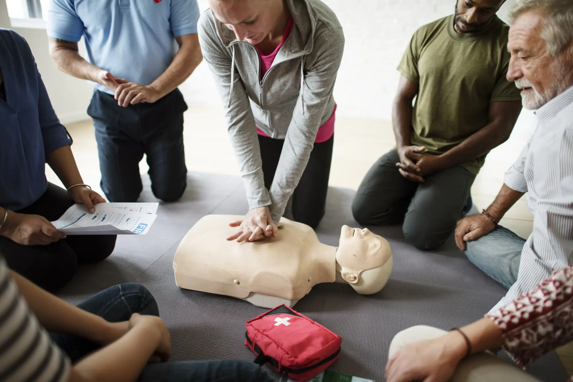 group diverse people cpr training class